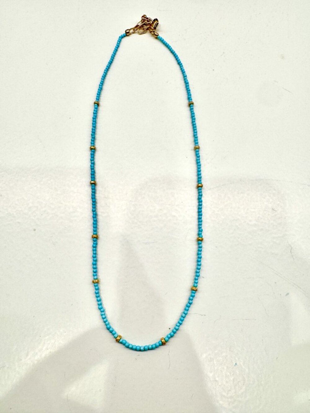 New, never worn sleeping beauty turquoise with 24k gold filled accents